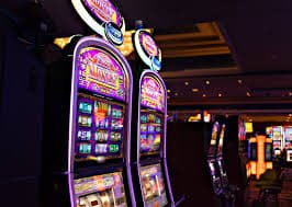okibet slots game selection displayed on a mobile phone screen